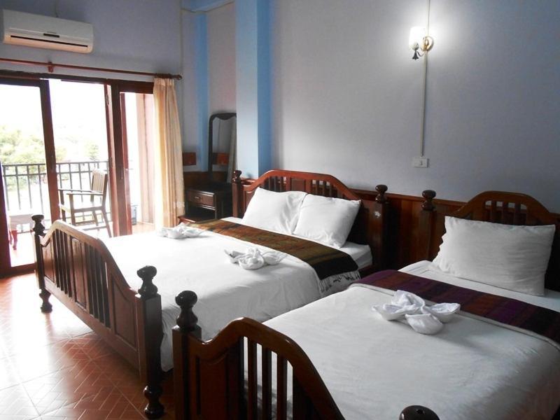Domon Hotel Ванг-Виенг Номер фото